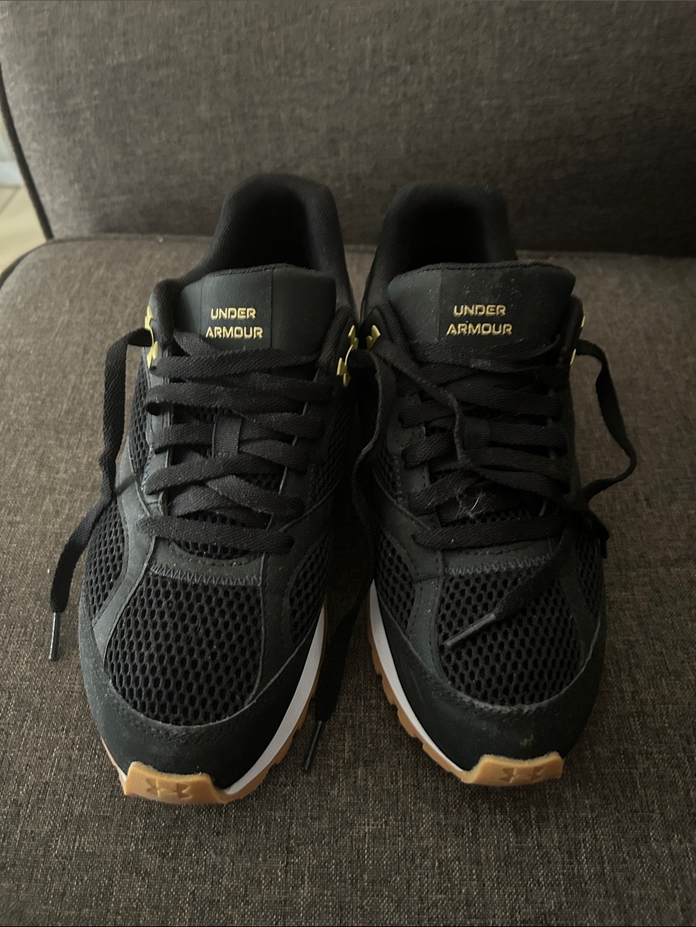 Under Armour Black Athletic Sneakers with Gold Logo Accent